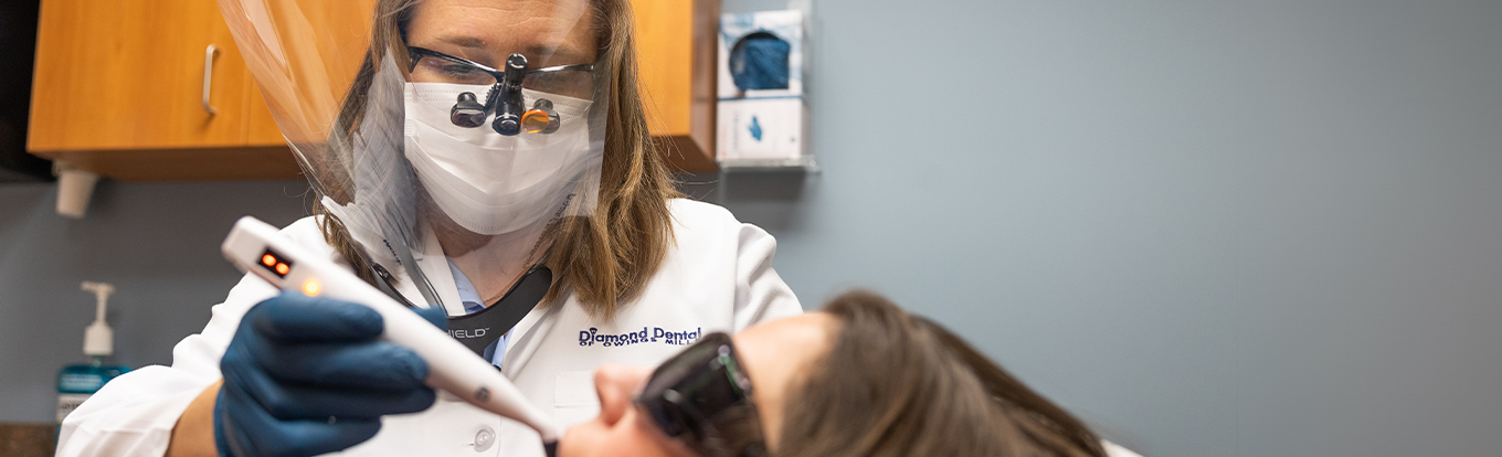 Owings Mills Dentist Dr Monica Mattson treating a dental patient